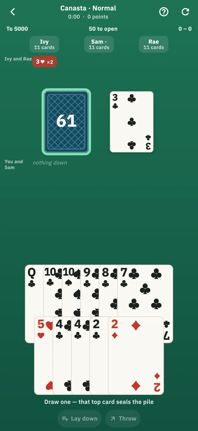A hand of Canasta against three opponents, with the stock and discard pile on the green felt, the red threes counted at the side, and the player’s hand fanned across the bottom.